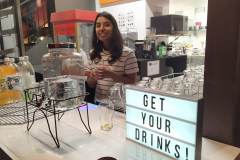 Andrea serving drinks