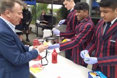 New Principal Mr Mitchell buys a hot dog