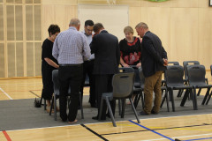 School Kaumatua and leadership pray before the Powhiri